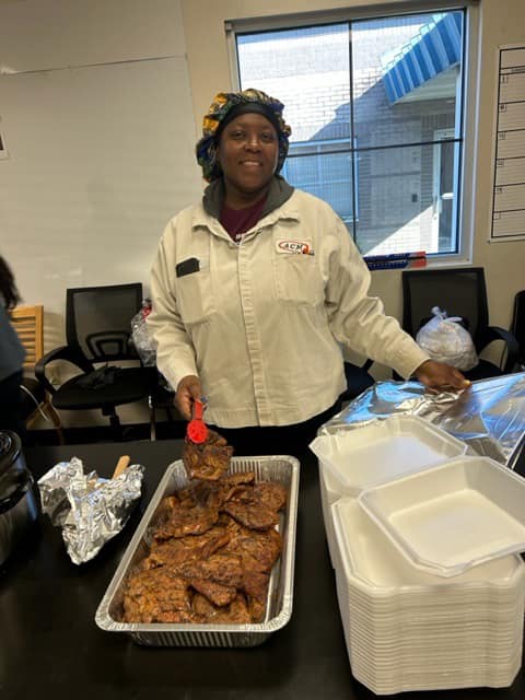 ACM worker serving food