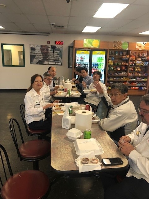 ACM workers enjoying lunch together